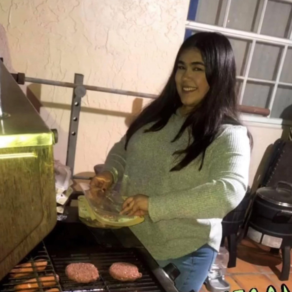 Ashley Esposito at her home grilling burgers